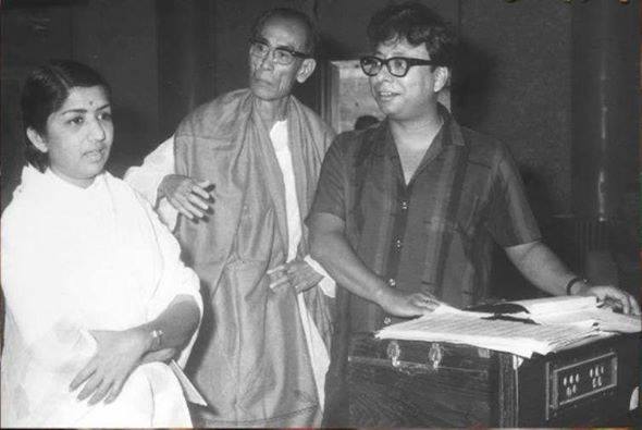 S D Burman, Lata Mangeshkar and R D Burman rehearsing a song.