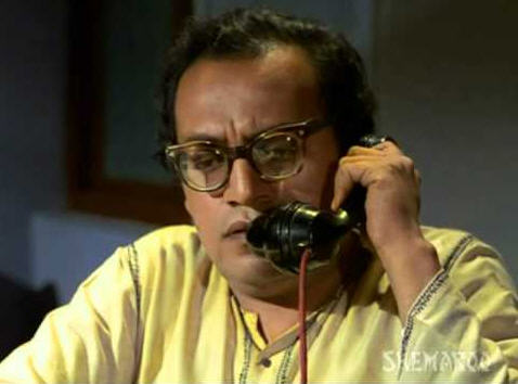 Utpal Dutt as Mamaji in Guddi