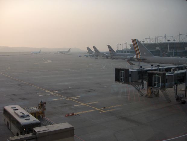 Sunil looked out of the window to catch a final glimpse of the Kennedy International Airport, fast receding below