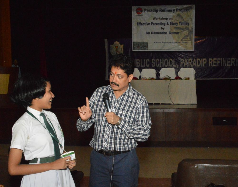 Ramendra Kumar explaining to a student