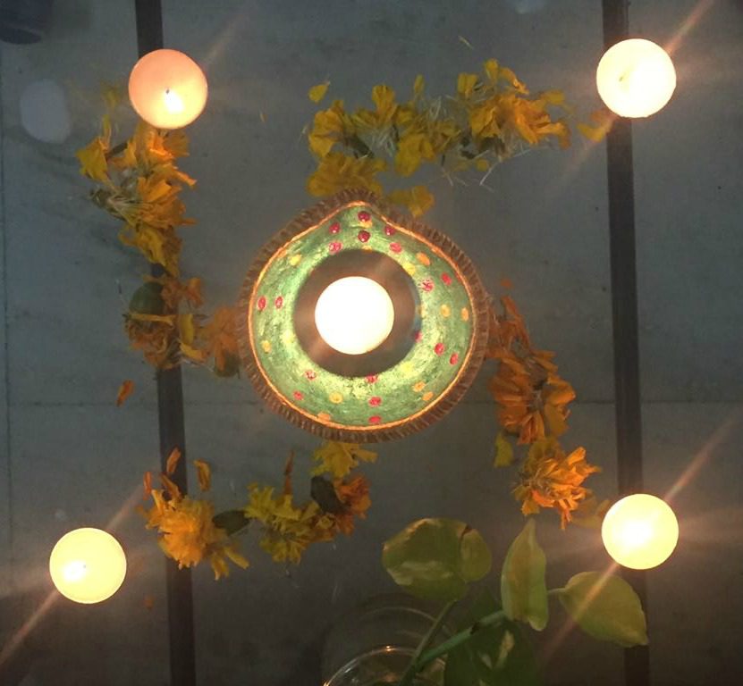 Painted diyas using pearl colours