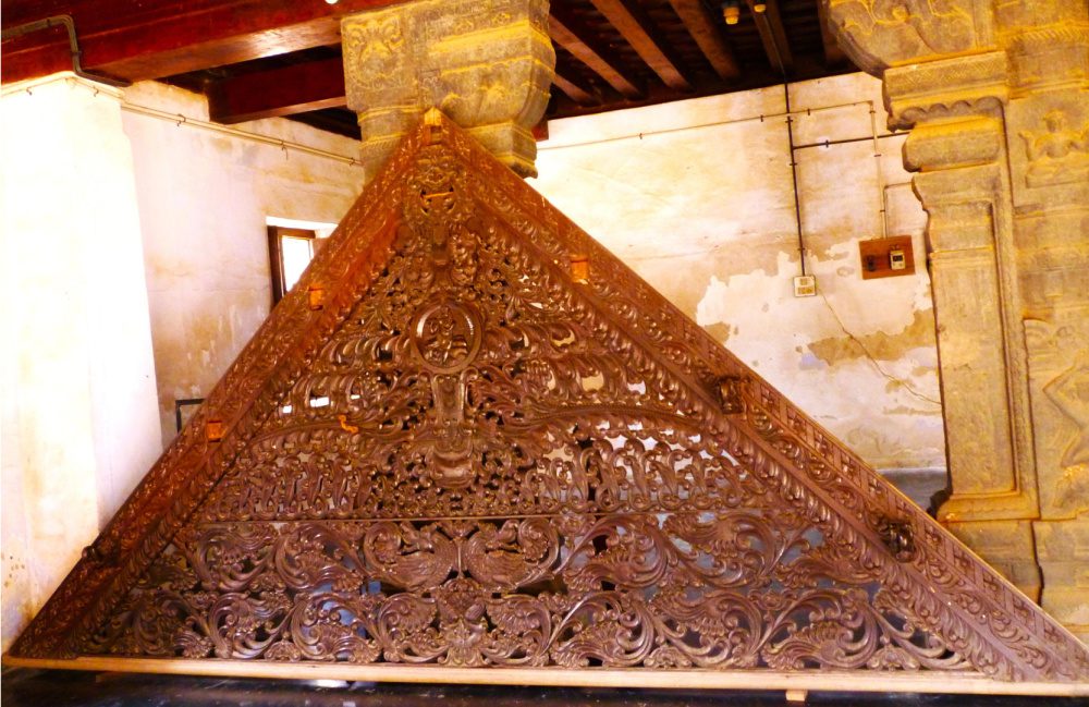 An intricately worked wood panel